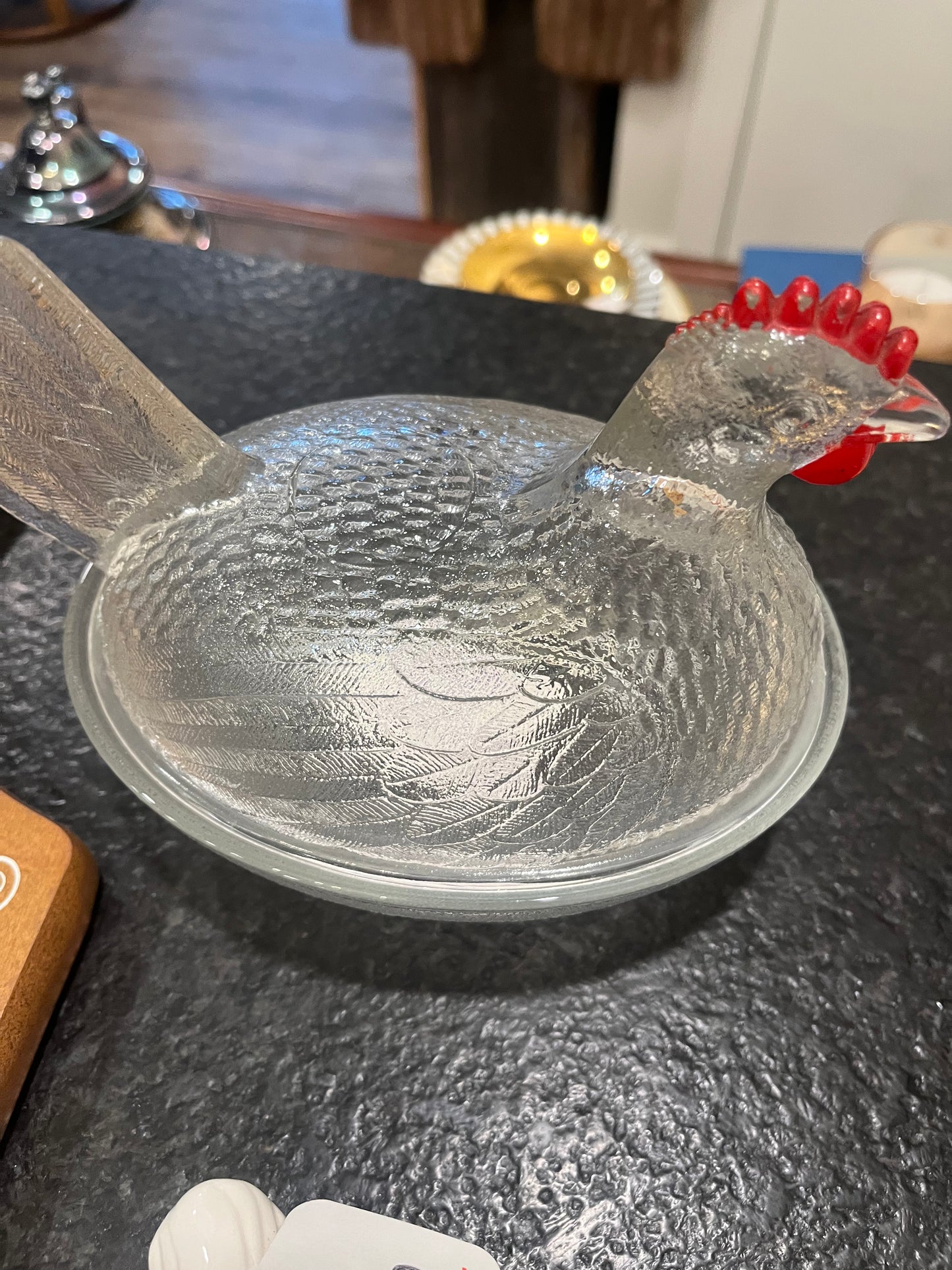 Clear glass hen on nest