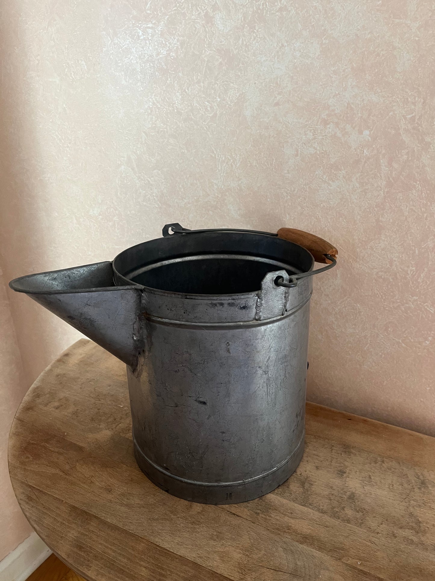 Vintage water pail with spout